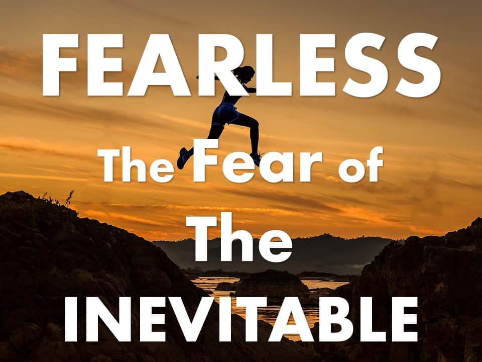 Text: Fearless: the Fear of the Inevitable, picture of woman jumping over a canyon